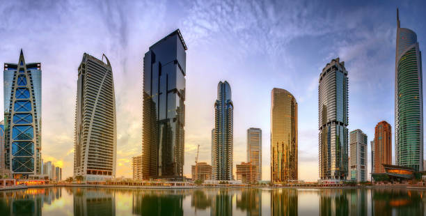 istock Panoramic view of Business bay and Lake Tower, reflection in a river, UAE 643707720