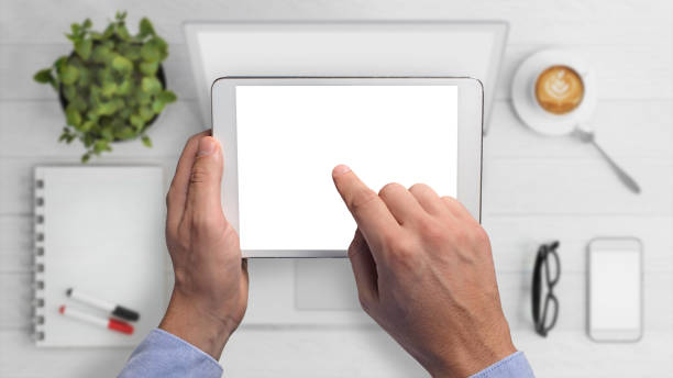 istock Knolling business hipster man holding tablet 643708196