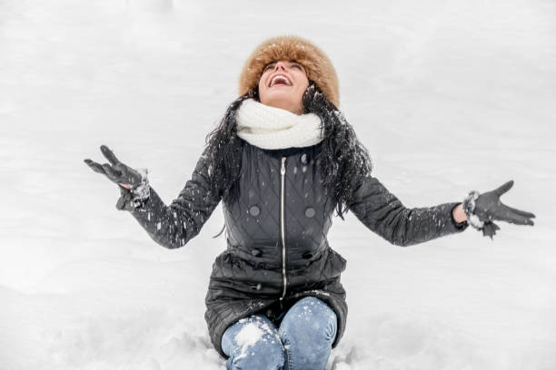 istock Beautiful winter woman daydreaming 643710992