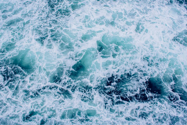 istock Background blue waves of the sea. 643711268