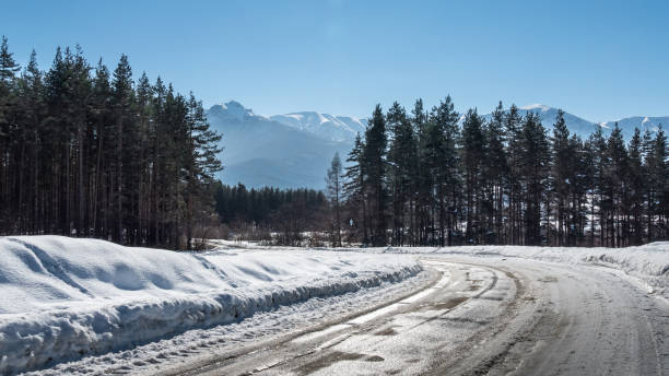 istock Winter road in the mountains 643711312