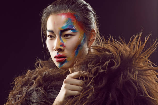 istock Portrait of Young Beautiful Asian Model in Studio Setting 643714384