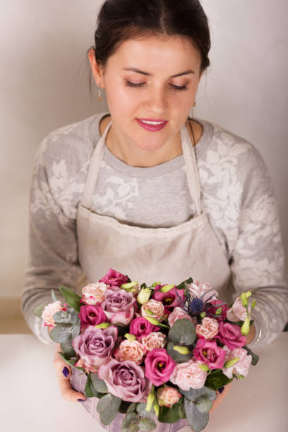 istock Woman with flowers 643715344