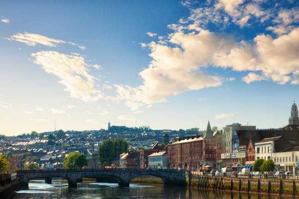 St. Patrick's Bridge spanning the River Lee in Cork, Ireland St. Patrick's Bridge at sunset spanning across the River Lee in the city of Cork in County Cork, Ireland. county cork stock pictures, royalty-free photos & images