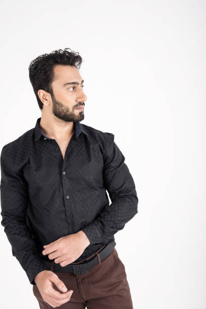 istock Young man in black dress 643724010
