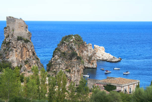 istock Scopello beach, Sicily, Italy viewed from the woods above (Tonnara di Scopello) 643730386