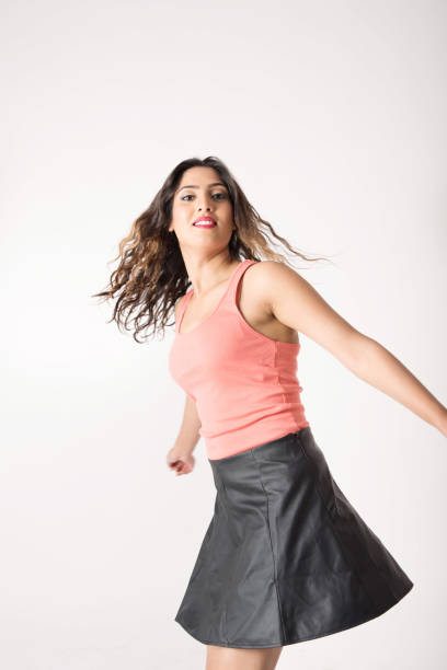 istock Young pretty girl dancing 643730398