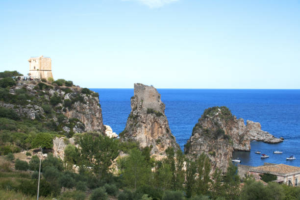 istock Scopello beach, Sicily, Italy viewed from the woods above (Tonnara di Scopello) 643730408