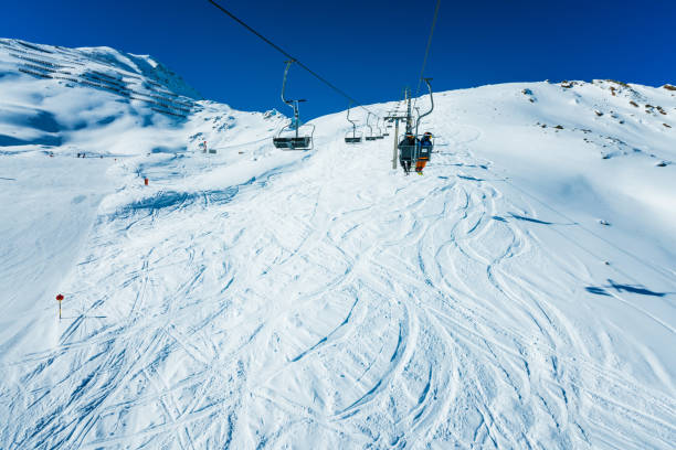 istock Skiers skiing at winter ski resort Soelden 643750562