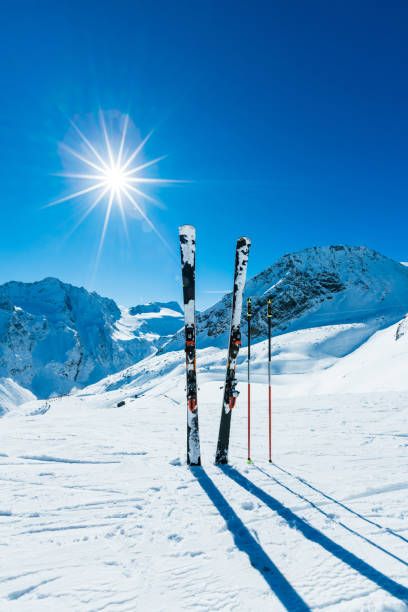 istock Skis and ski poles on remote slope 643750698