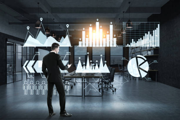 istock Businessman and six graphs on glassboard 643754148