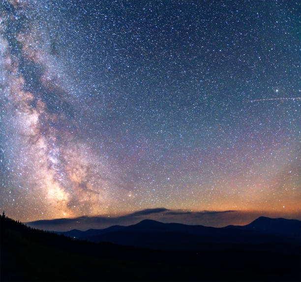 istock fantastic winter meteor shower and the snow-capped mountains 643756942
