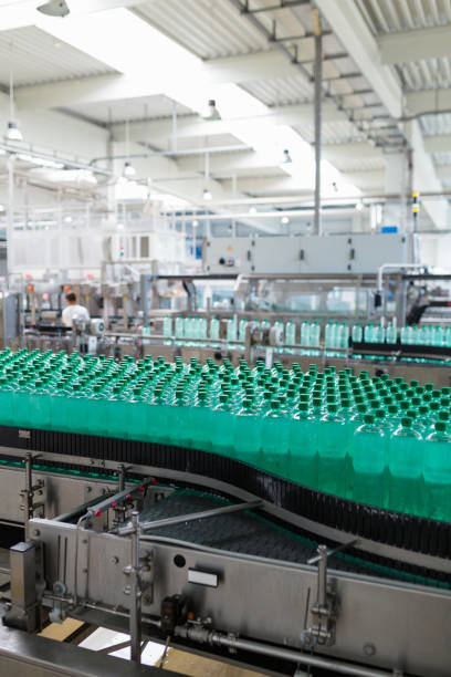 istock Water bottling factory interiors and machinery. 643757396