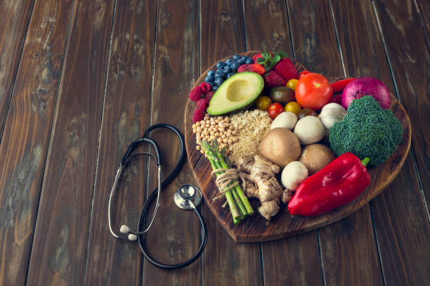 istock Healthy food on a heart shape cutting board. 643764508