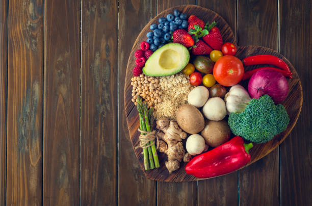 istock Healthy food on a heart shape cutting board 643764526