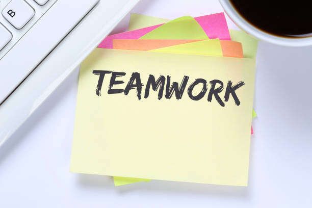 istock Teamwork team working together business success desk 643778612