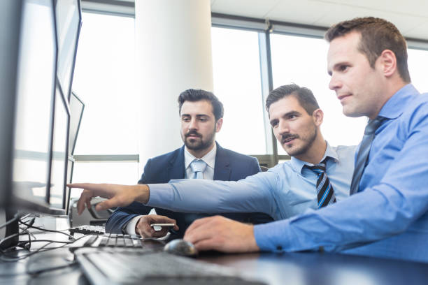 istock Business team working in corporate office. 643779524
