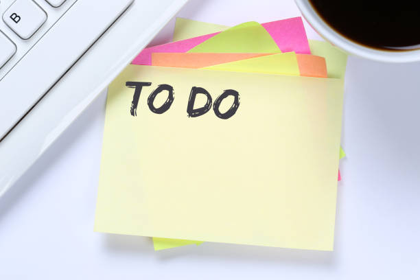 Personal organization concept featuring a sticky note with 'done,' a planner, and stationery items. Ideal for productivity, task management, planning, and organization themes in business or personal contexts.