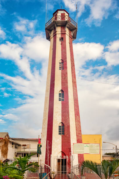 The Lighthouse in Georgetown Guyana Stock photo of the Georgetown Lighthouse. The 31 m (103 feet) high octagonal structure is a famous Georgetown landmark with its distinct vertical red and white stripes. The Lighthouse, located on Water Street, is a National Monument. guyana stock pictures, royalty-free photos & images