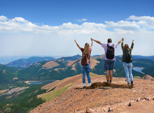 istock Happy family on a hiking trip on vacation. 643805114