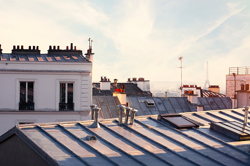 Paris rooftops in the evening with Eiffel Tower