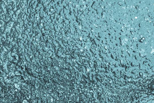 istock brilliant surface asphalt of turquoise color 643818258