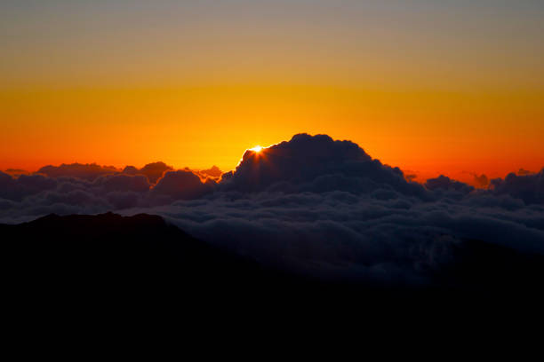istock Sunrise in a sea of clouds. 643818352