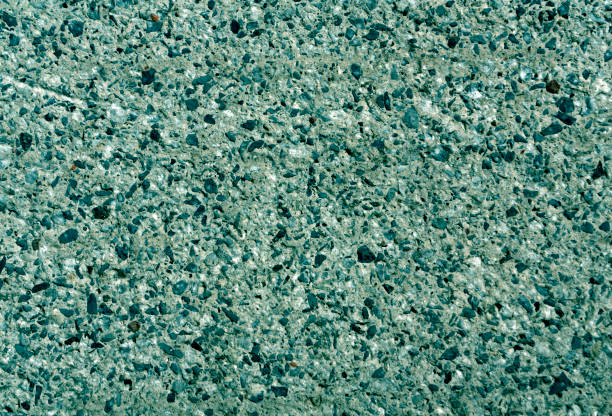 istock Cyan color grungy cement wall 643828888