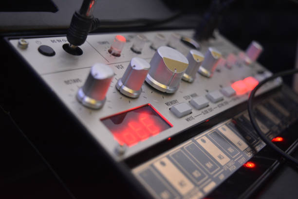 Electronic musical instrument or audio mixer or sound equalizer with patch cables (analog modular synthesizer)