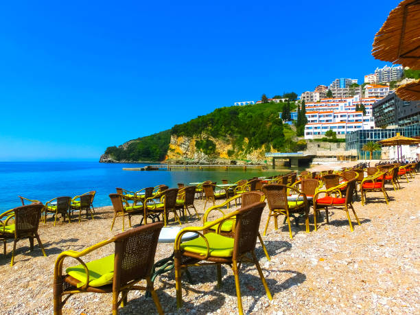 istock The empty tables on sea beach restaurant of Budva 643835146