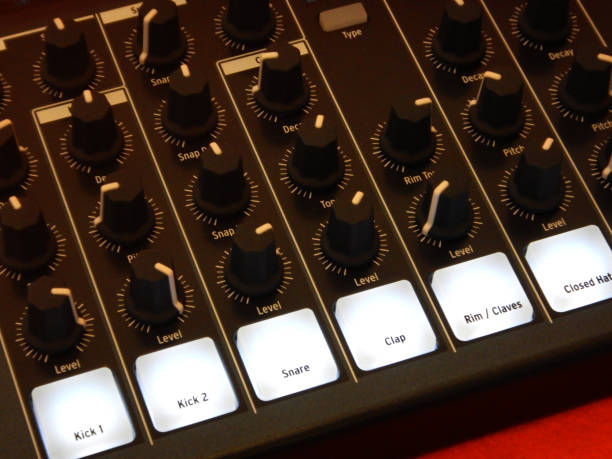 istock Electronic musical instrument or audio mixer or sound equalizer on a orange background (analog modular synthesizer) 643838528