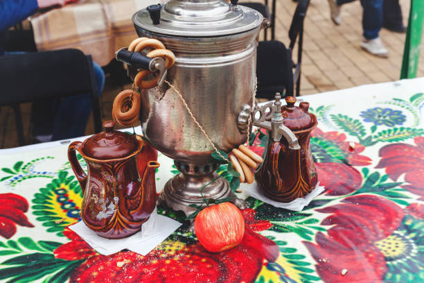 istock Samovar, bagels and tea on bright tablecloth on Russian holiday carnival Maslenitsa 643838648