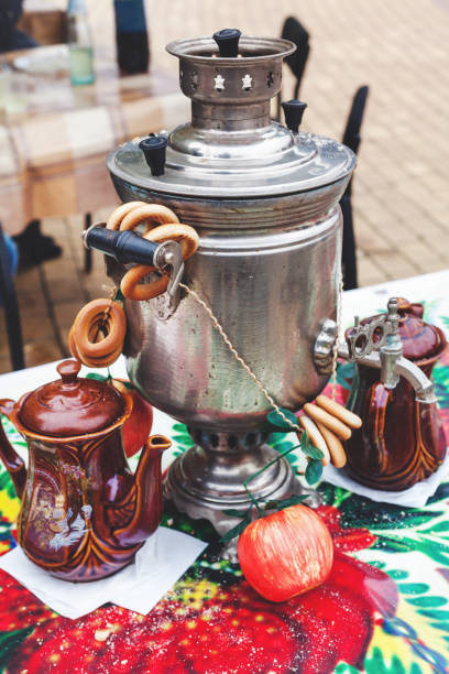 istock Samovar, bagels and tea on bright tablecloth on Russian holiday carnival Maslenitsa 643838764