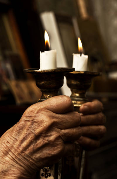 istock Burning candle in a church 643838772
