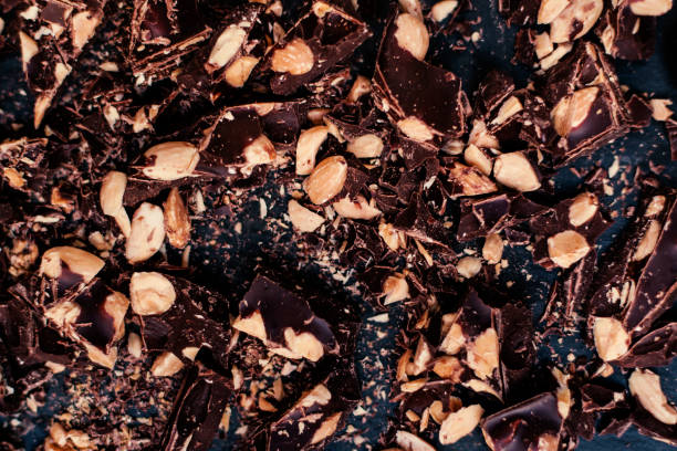 istock Crushed black chocolate dark chocolate/ Luxury chocolate background close 643839340