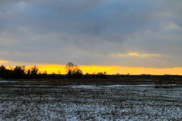 istock Sunset on the winter meadow 643840354