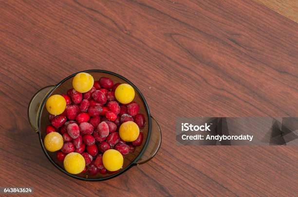 Dish With Frozen Cherry Plum And Dogwood Stock Photo - Download Image Now - Autumn, Backgrounds, Beauty In Nature