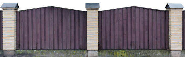 istock Solid wooden fence from vertical boards of dark lilac color. Isolated with patch panoramic collage 643844136