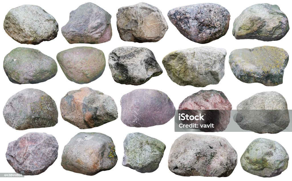 Twenty big granite stones and  boulders of various forms and colors  set. Isolated on white collage from many  outdoor photos Cut Out Stock Photo