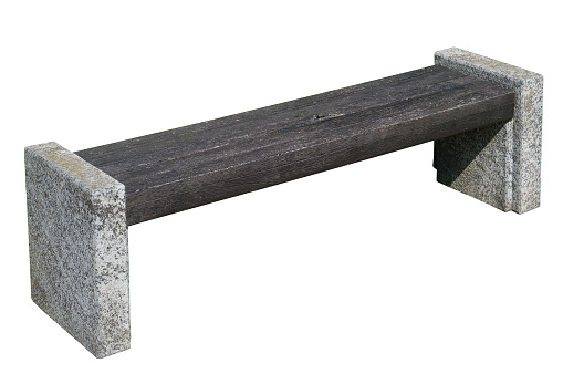 Very simple vintage park bench - granite sidewalls and brown aged wooden boards. Isolated with patch