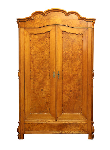 Antique vintage wood wardrobe isolated on white