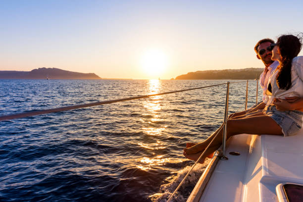 istock Romantic couple on yacht at sunset 643851628