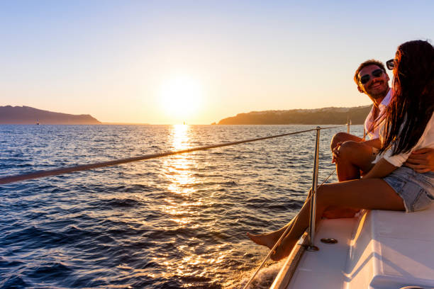 istock Romantic couple on yacht at sunset 643851982