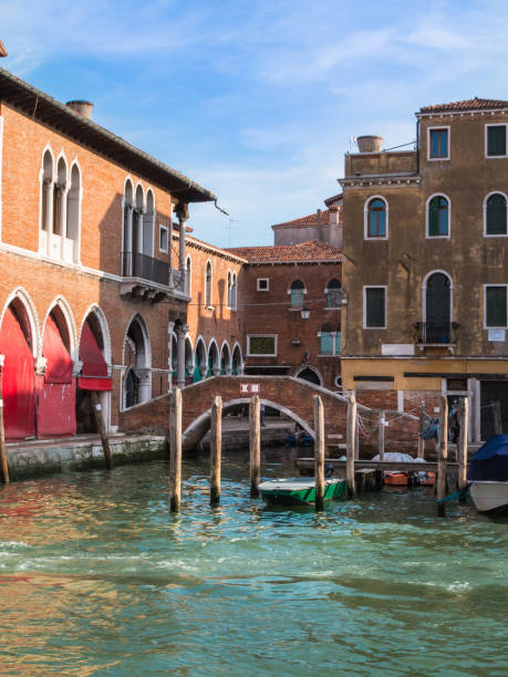 istock Bridge and Historical Building Facade in Venice, Italy 643855944