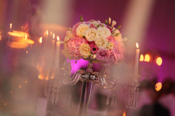 istock Colorful flower bouquet decoration with candles 643864258