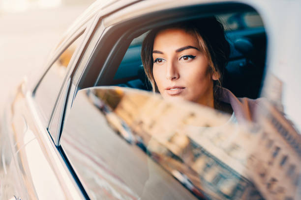 istock Beautiful Woman Inside Of A Car 643868354
