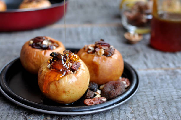 istock baked apples with honey and nuts 643871276