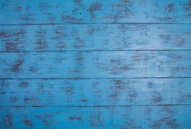 istock Wooden blue background with scuffed 643874952