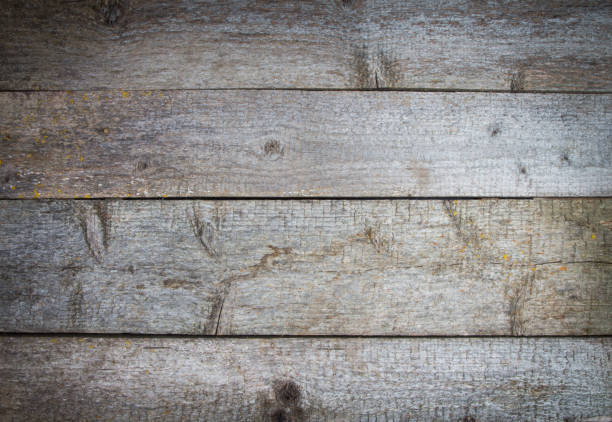 Blank old shabby wooden table. Space for your text. Natural worn plank. Darkening at the edges, vignette