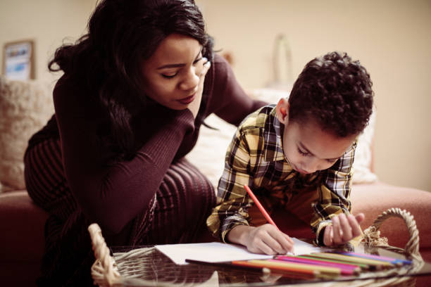 istock African American woman with her son. 643878336